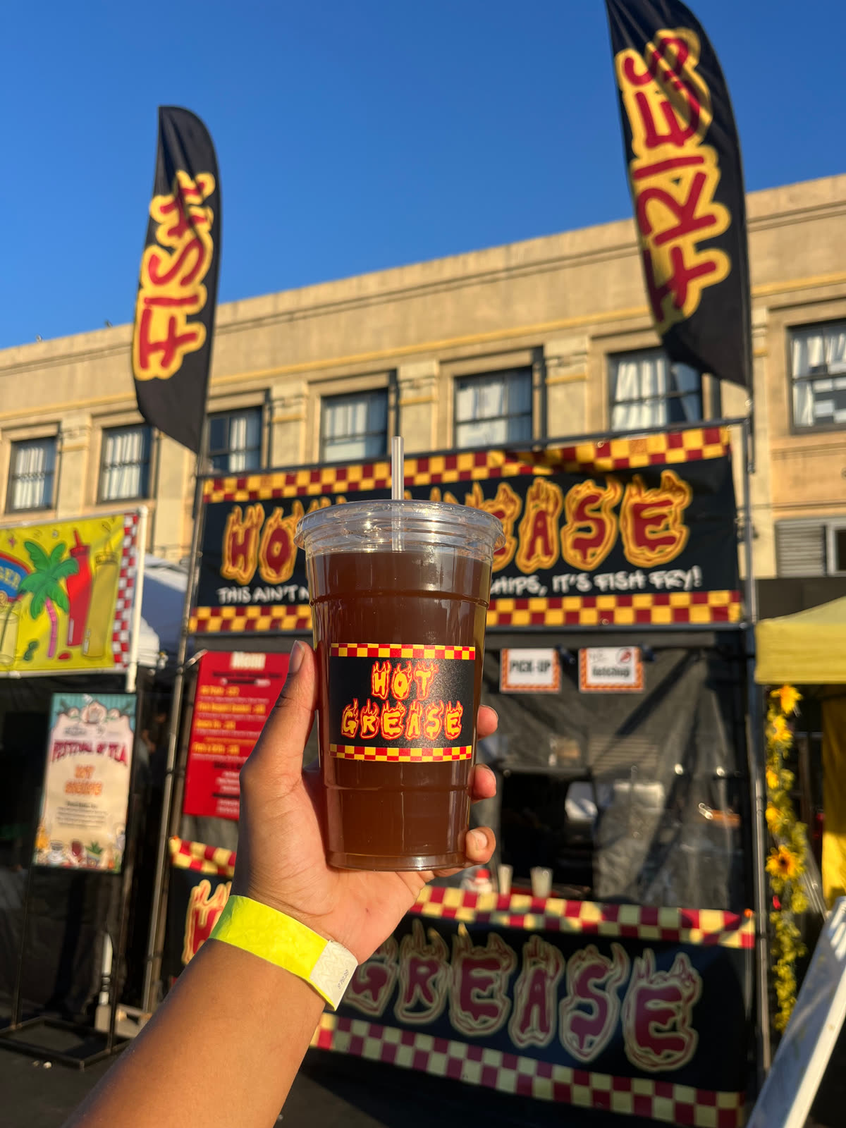 Hot Grease Mint Julep Arnold Palmer in front of the stand